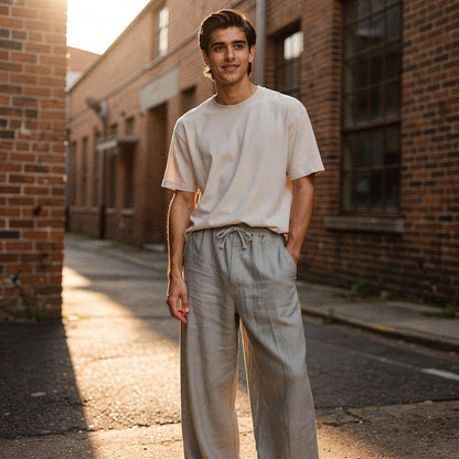 Lightweight casual trousers in a relaxed fit, featuring a subtle beige color and pockets, view