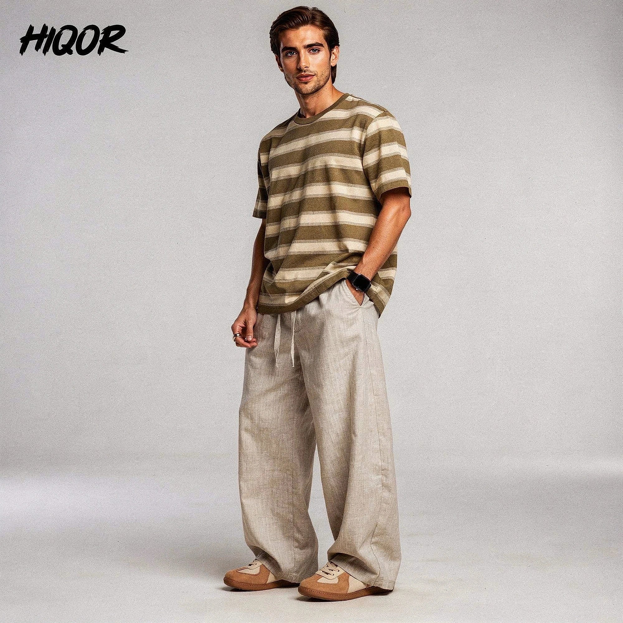 View of relaxed lightweight summer trousers in light beige, made