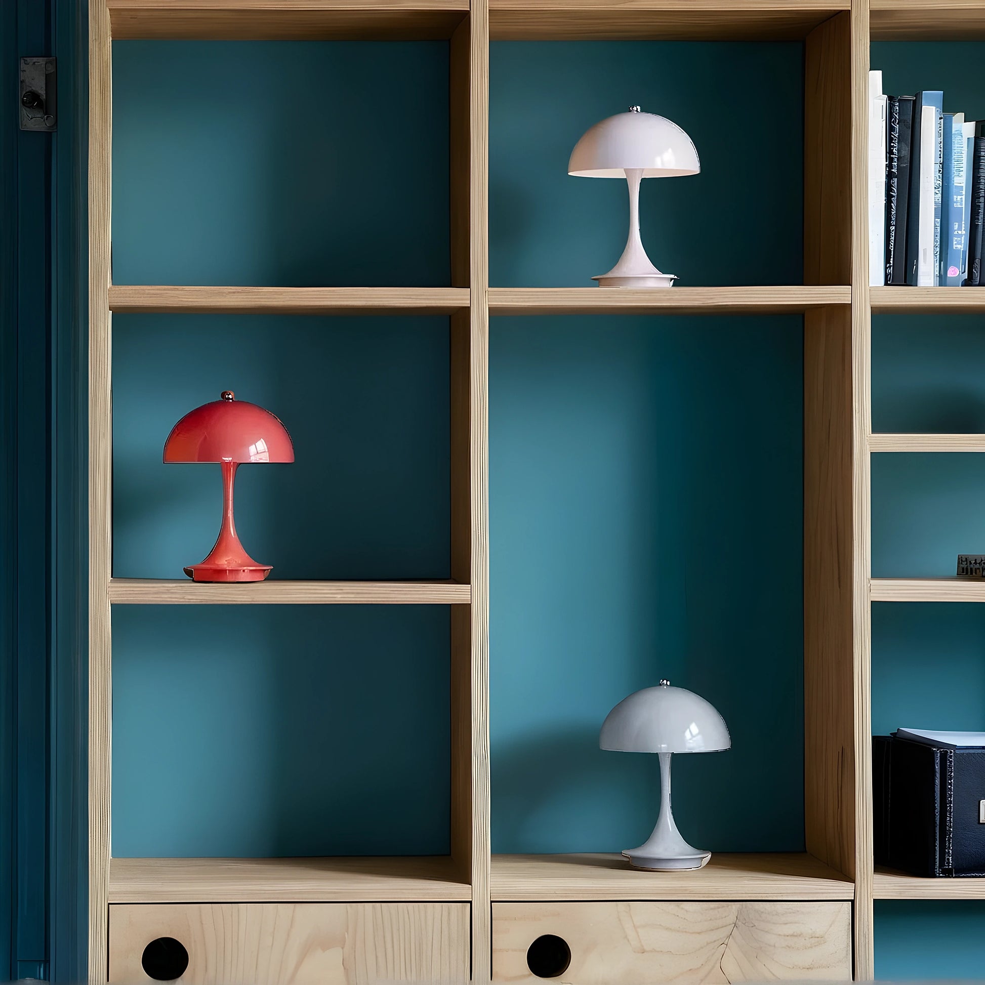 View of a sleek contemporary rechargeable table lamp in a warm brass finish, showcasing a minimalist design with a fabric shade