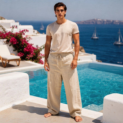 Lightweight casual trousers in a soft beige fabric, featuring a relaxed fit and pockets, view