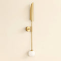 Brass wall sconce fixture with dual light design, refined Nordic style, view showcasing elegant curves and warm finish