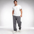 View of relaxed wide leg denim pants in light blue, featuring a classic five pocket design and soft cotton material