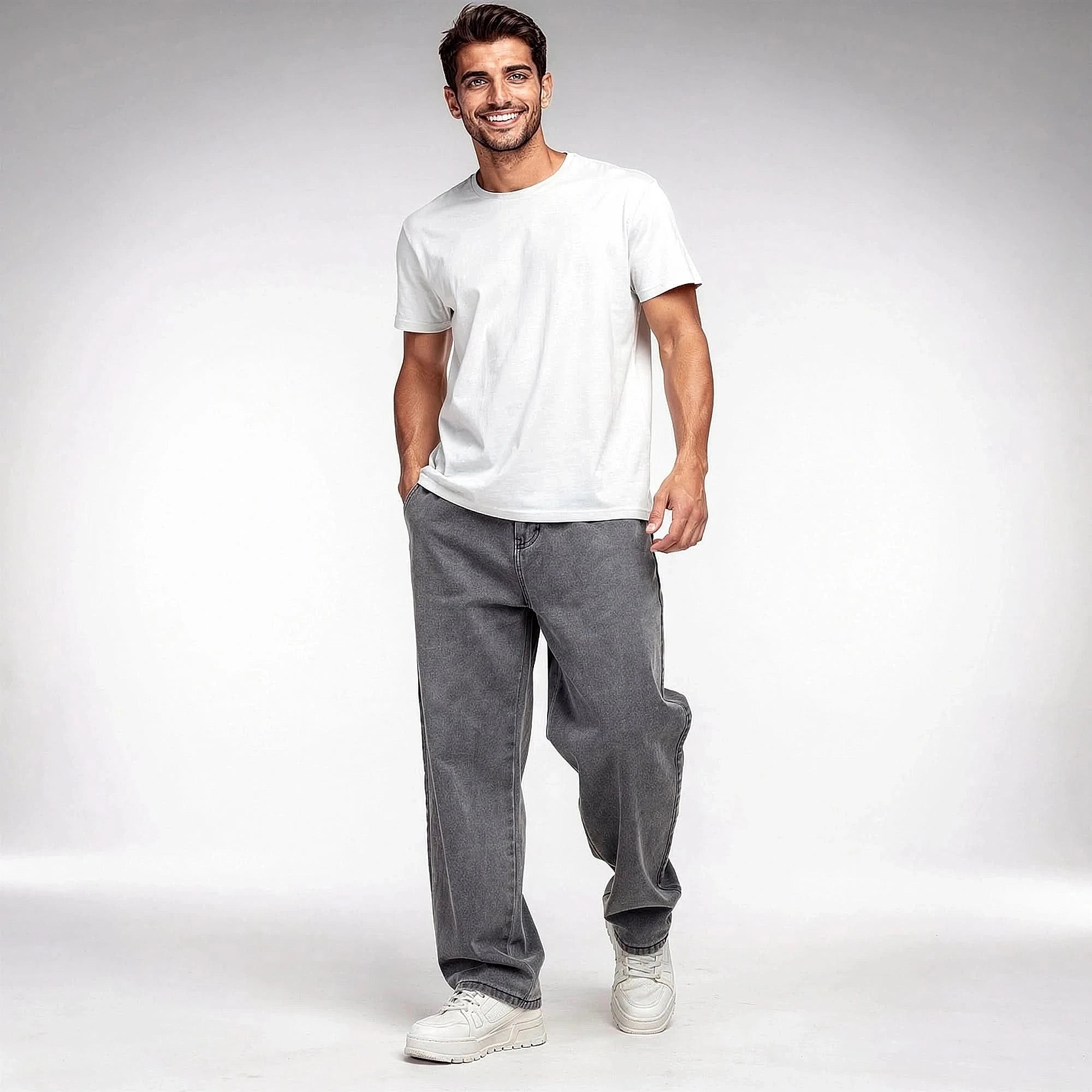 View of relaxed wide leg denim pants in light blue, featuring a classic five pocket design and soft cotton material