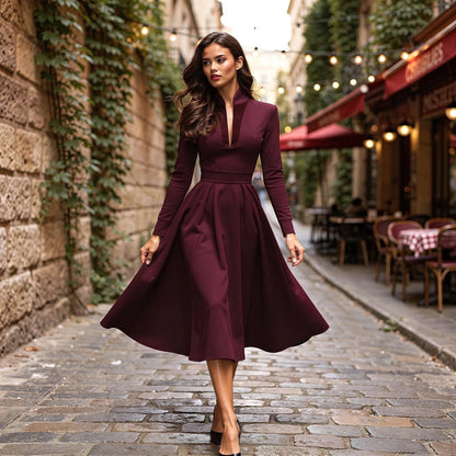 Elegant navy blue midi dress with a V neckline and flowing skirt, view showcasing its sophisticated silhouette