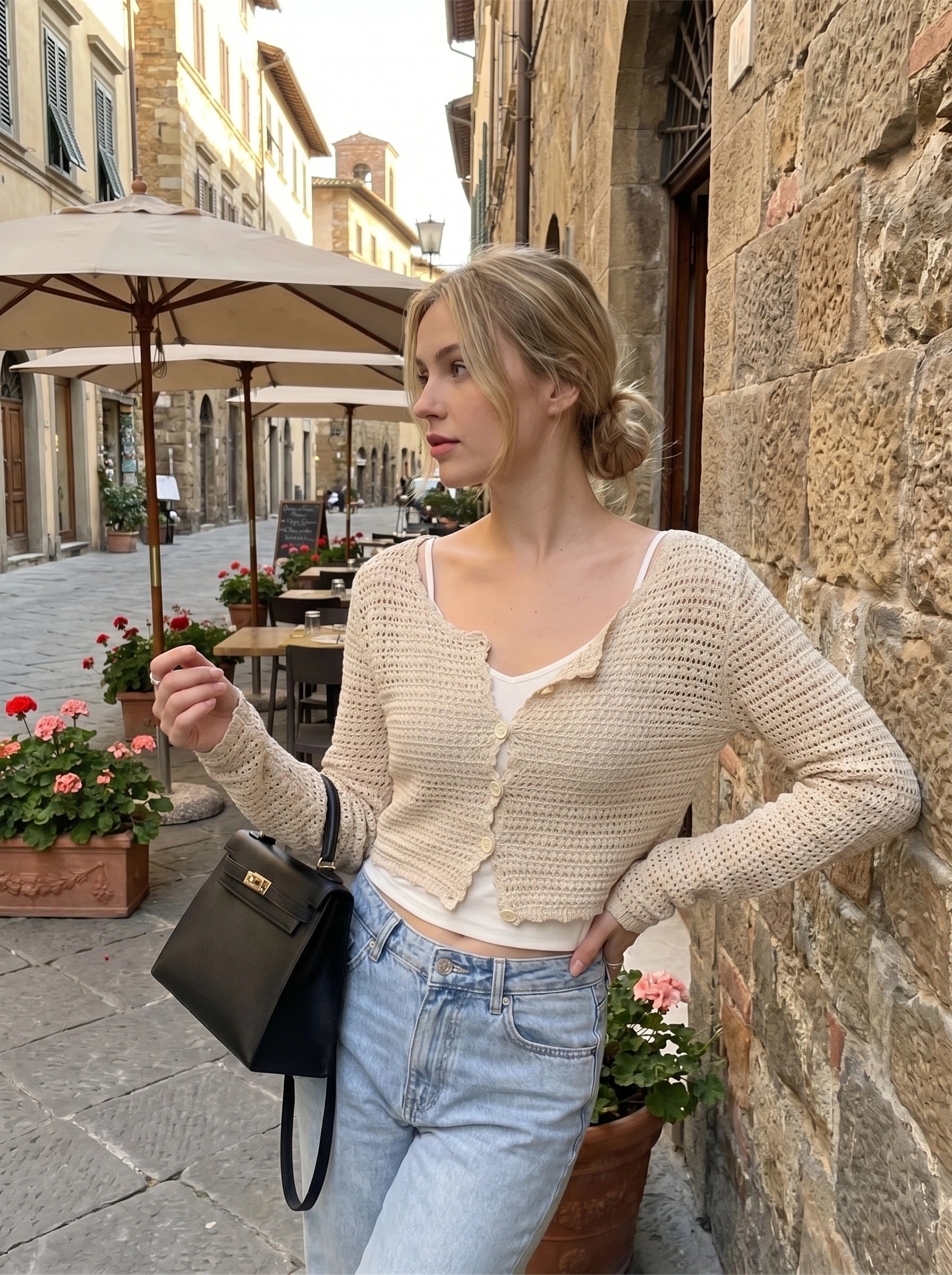 Close up view of the Womens Effortless Shrunken Spring Cardigan showing the soft fabric texture and precise stitching details in a , versatile design.