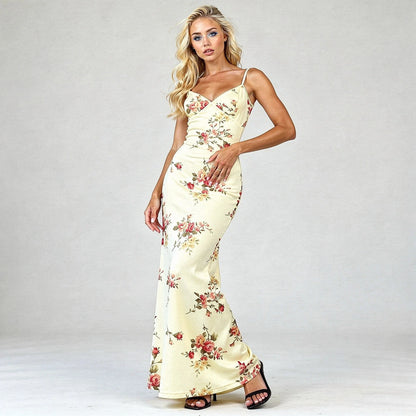 View of a women's elegant bodycon maxi dress featuring a vibrant floral print and a fitted silhouette