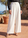 Close up of the women's effortless spring pants showing the soft fabric texture, precise stitching, and relaxed fit, perfect for spring styling.