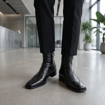 Close up of the women's modern ankle boots showing rich fabric texture, precise stitching, and sophisticated design elements against a neutral background.