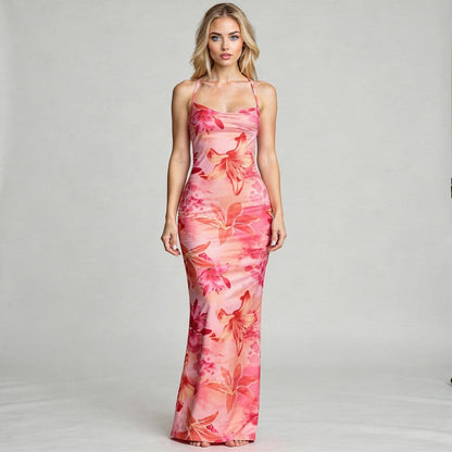 View of an off shoulder mermaid dress in deep red, featuring a fitted bodice and flowing skirt