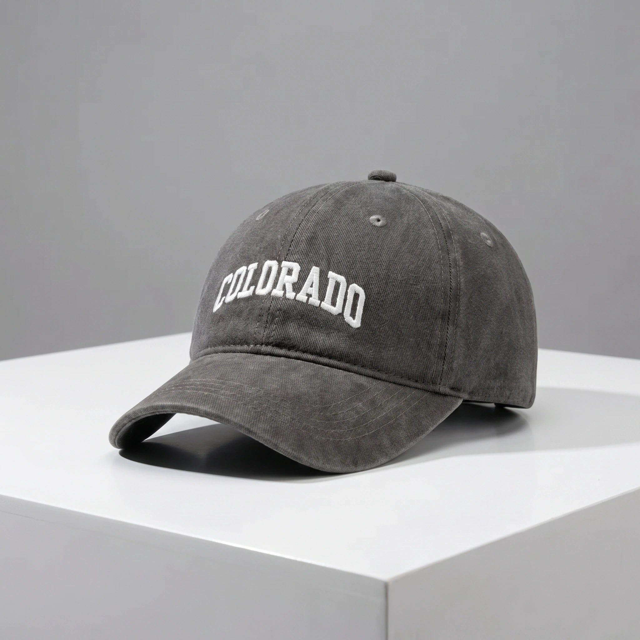 Close up view of the CanyonPeak baseball cap showing its durable fabric, precise stitching, and adjustable strap, showing its design for outdoor adventures.