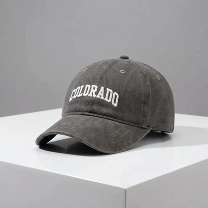 Close up view of the CanyonPeak baseball cap showing its durable fabric, precise stitching, and adjustable strap, showing its design for outdoor adventures.