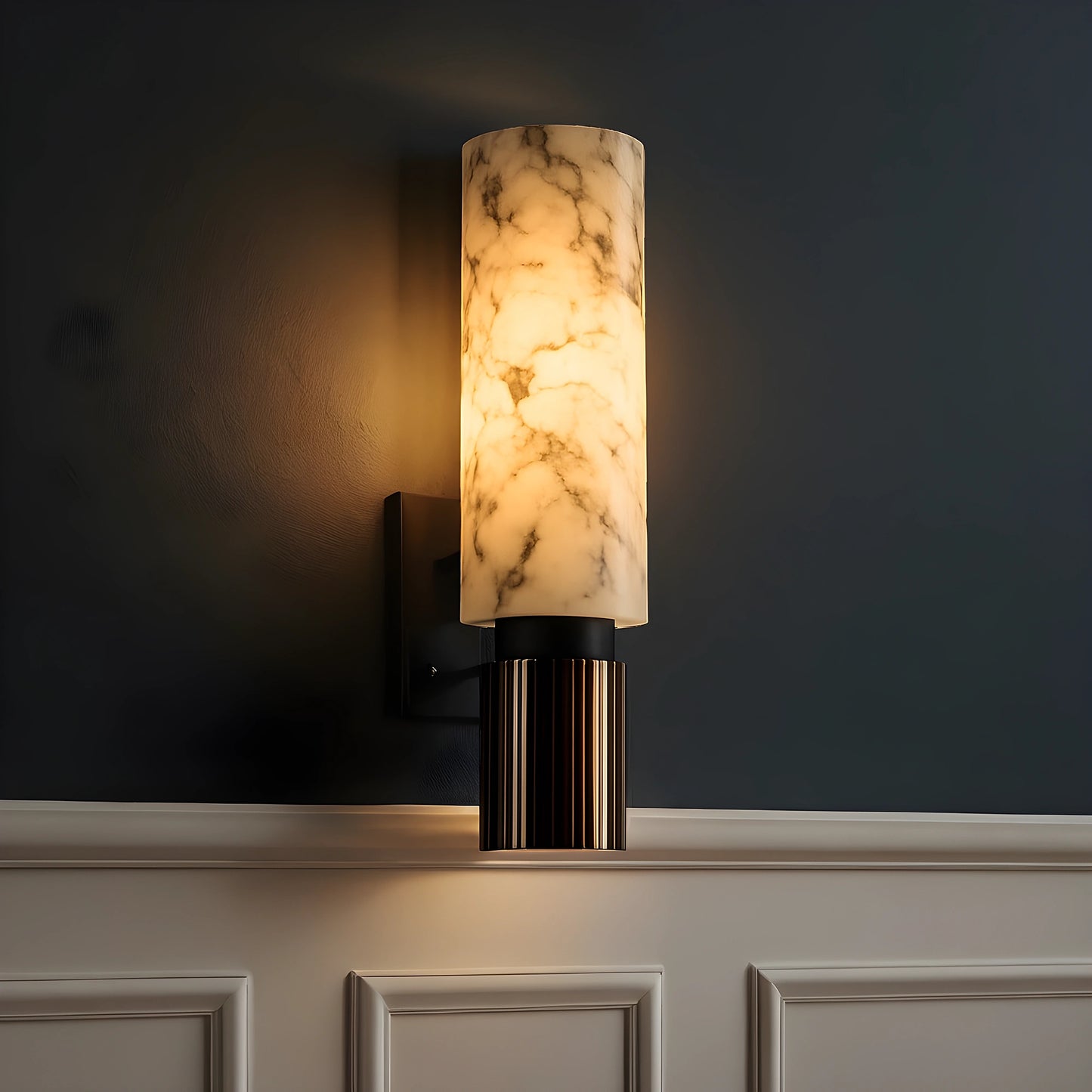 View of a chic Art Deco marble wall sconce featuring a gold finish and elegant geometric design
