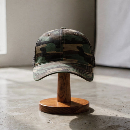 View of a relaxed vintage snapback cap in dark gray with a classic flat brim and adjustable strap