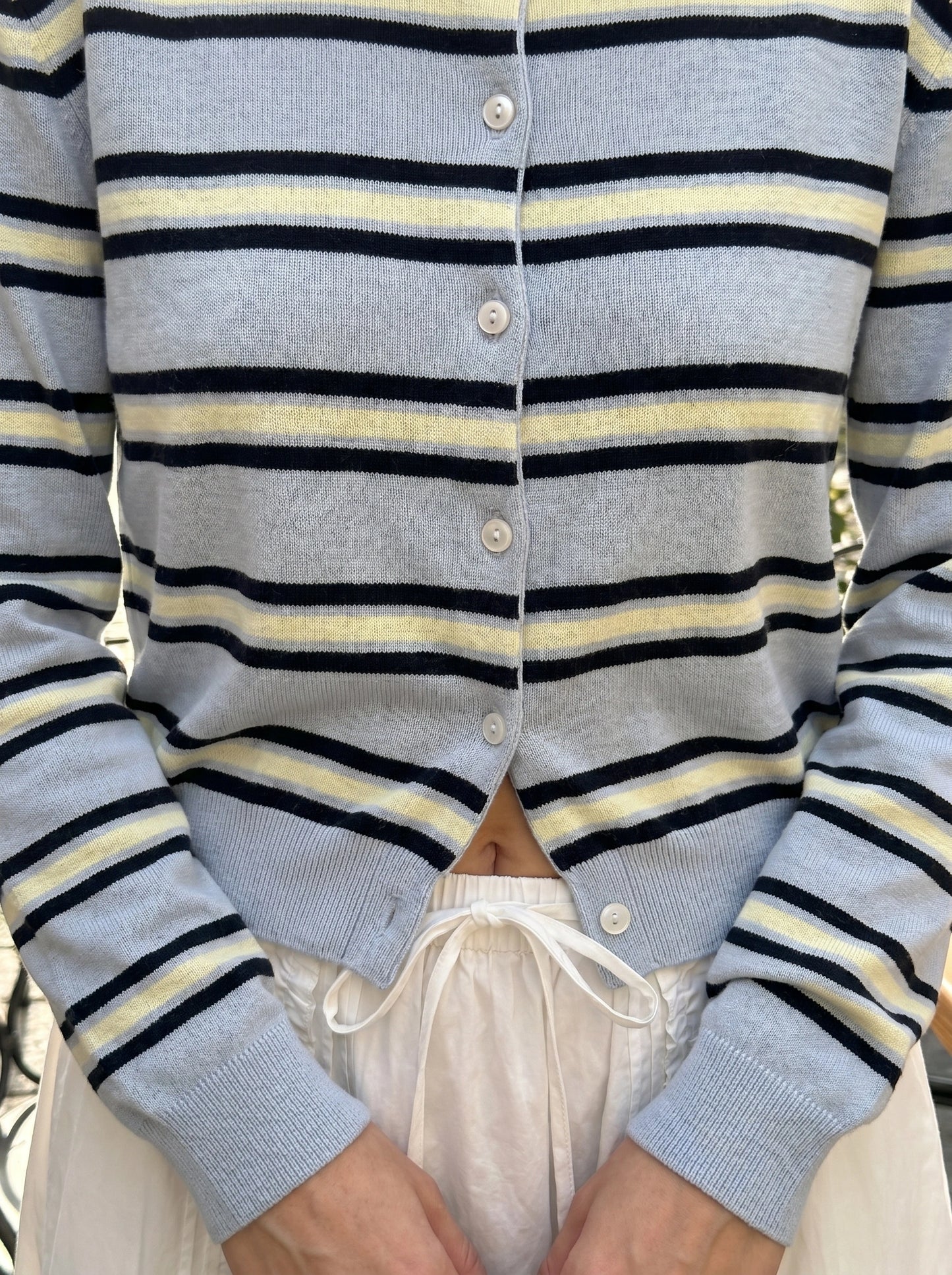 Close up view of the Womens Striped Autumn Cardigan showing the soft fabric texture and detailed stitching in warm autumn colors.