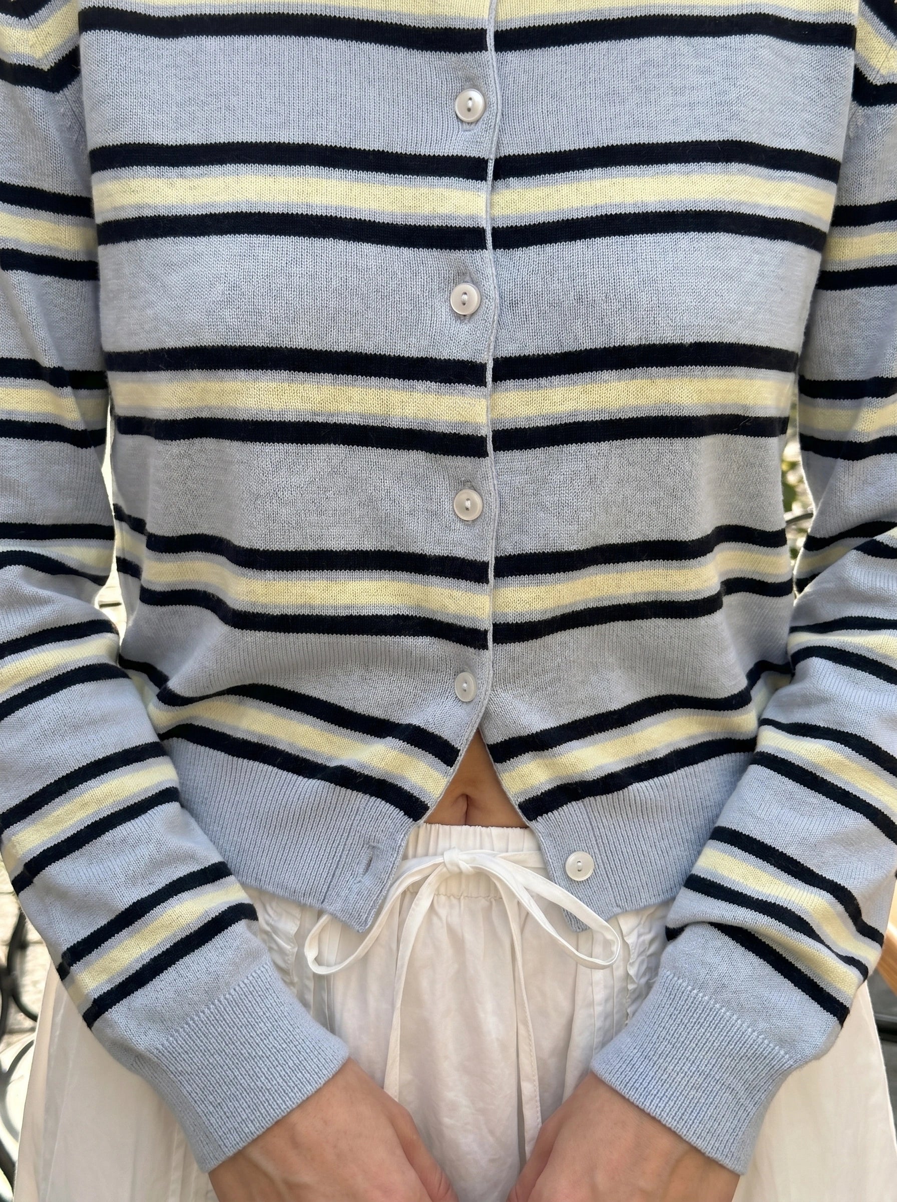 Close up view of the Womens Striped Autumn Cardigan showing the soft fabric texture and detailed stitching in warm autumn colors.