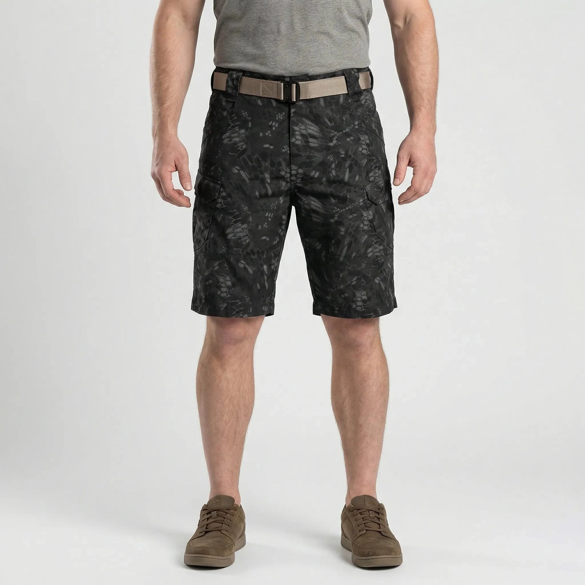 View of durable khaki cargo shorts featuring multiple pockets and a relaxed fit, showcasing the sturdy fabric and stitching