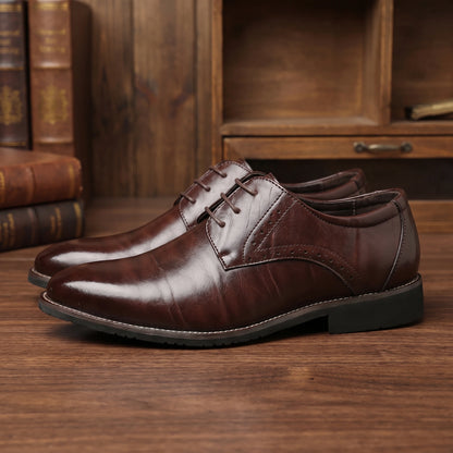 Close up view of the men's lace up dress shoes showing intricate stitching and brogue detailing on rich leather, perfect for formal occasions.