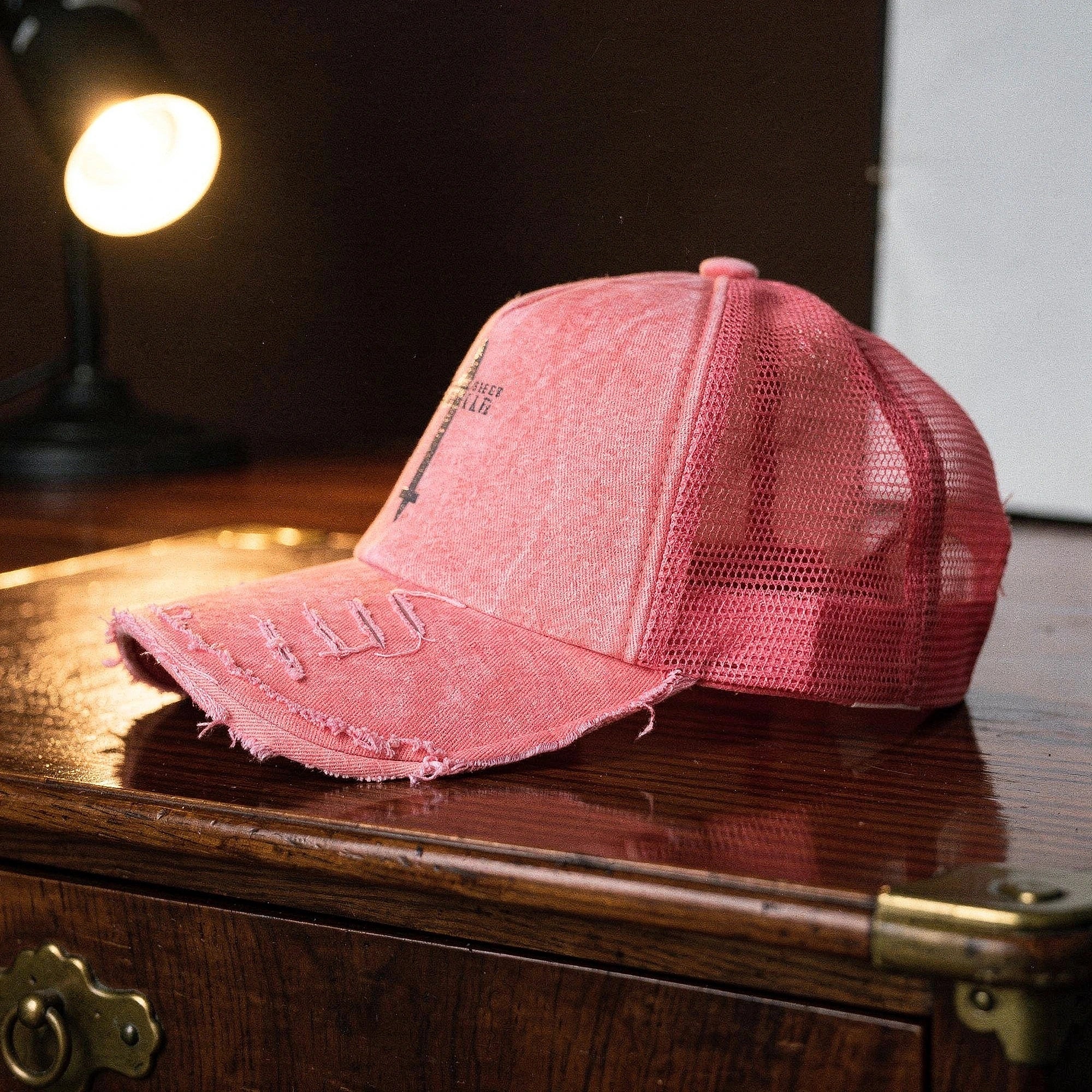 View of a women's summer baseball cap in light pink, made