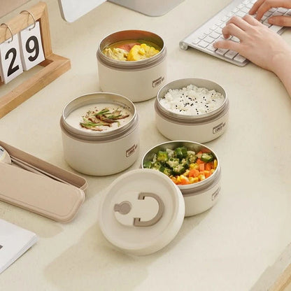 View of a chic insulated meal container set in a sleek design, featuring a durable exterior and secure lid for on the go dining