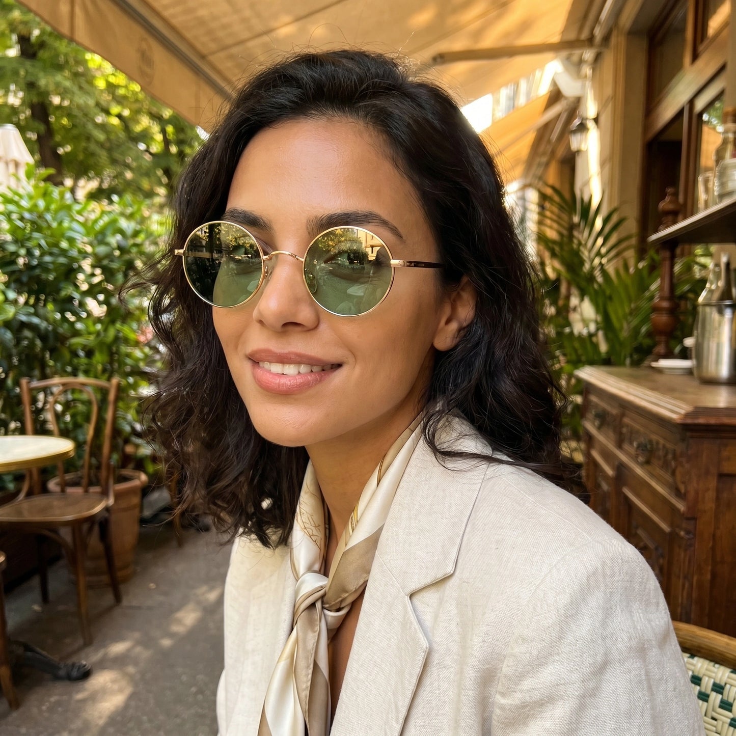 Close up view of the Womens Vintage Polarized Sunglasses showing the intricate detailing of the frame and lenses against a soft, neutral background.
