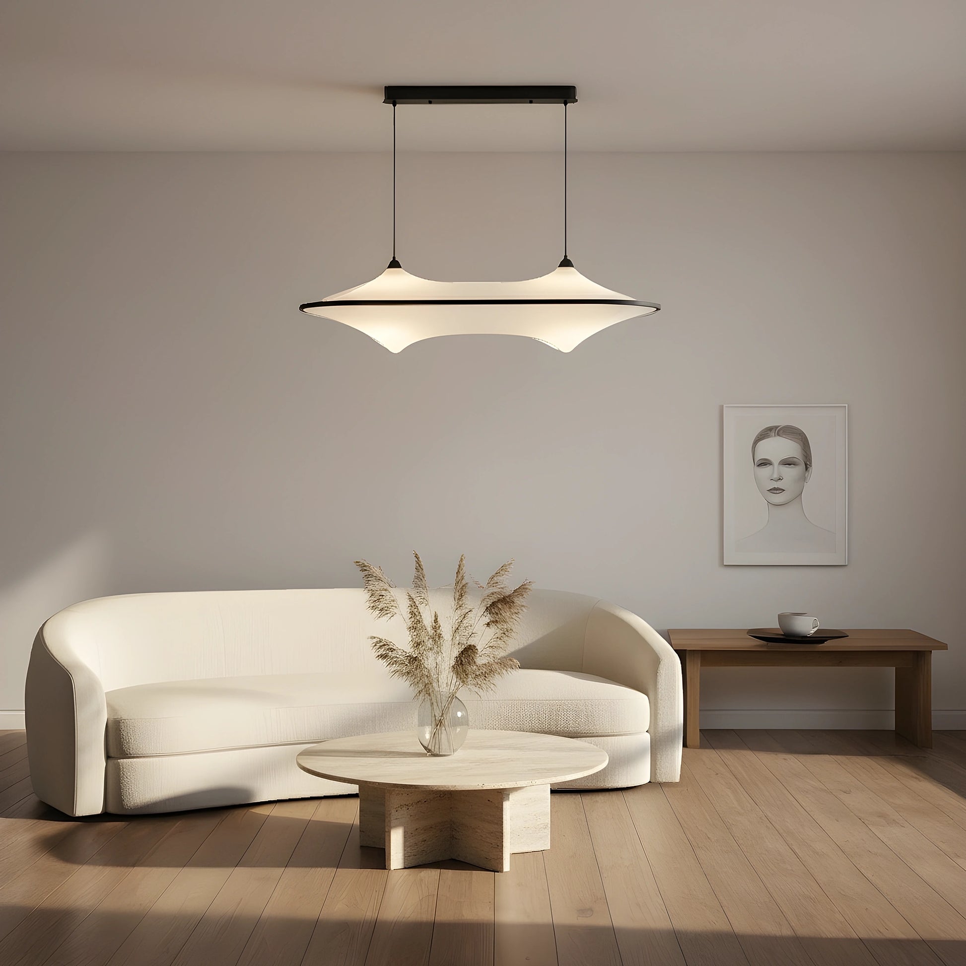 Close up view of the sleek modern iron pendant light fixture, showing its minimalist design, smooth curves, and intricate detailing against a white background.