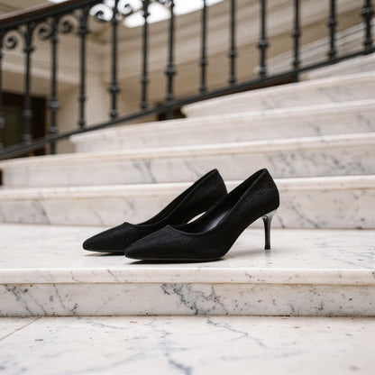 Elegant pointed mid heel sandals in soft beige leather, featuring a sleek design and ankle strap, detailed view