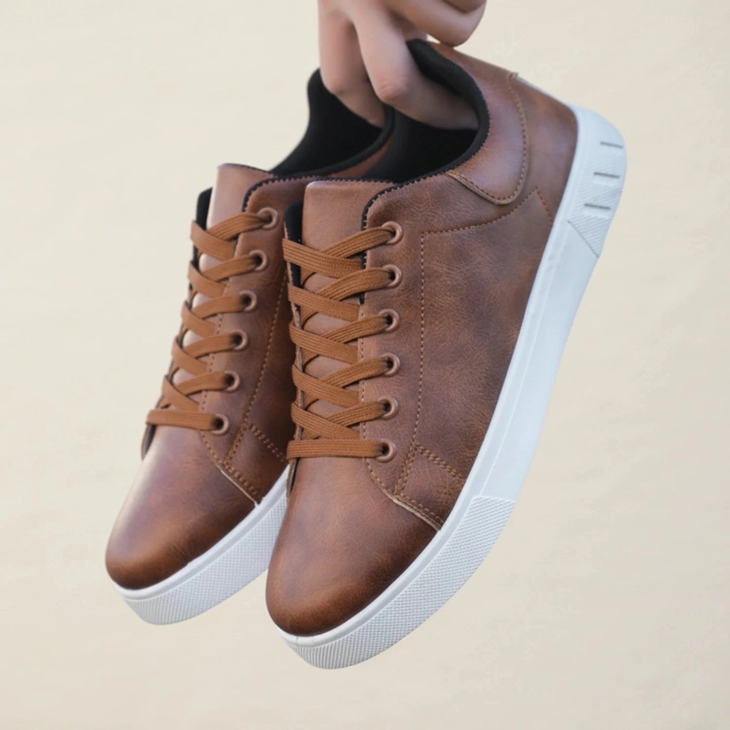 View of stylish men's casual shoes in dark brown leather, featuring a textured surface and cushioned sole
