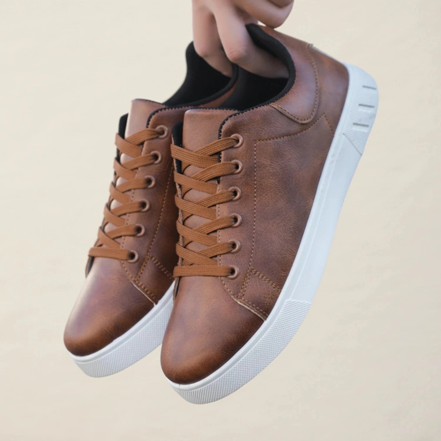 View of stylish men's casual shoes in dark brown leather, featuring a textured surface and cushioned sole