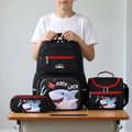 View of a stylish Oxford school backpack set in navy blue with multiple compartments and padded shoulder straps