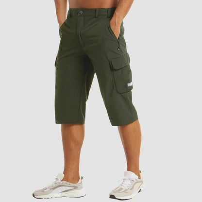 View of functional summer cargo shorts in khaki, featuring multiple pockets and a structured design for versatility
