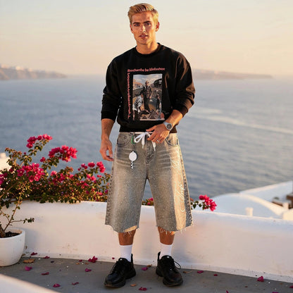View of relaxed denim knee length shorts in light blue, featuring a classic five pocket design and a comfortable fit