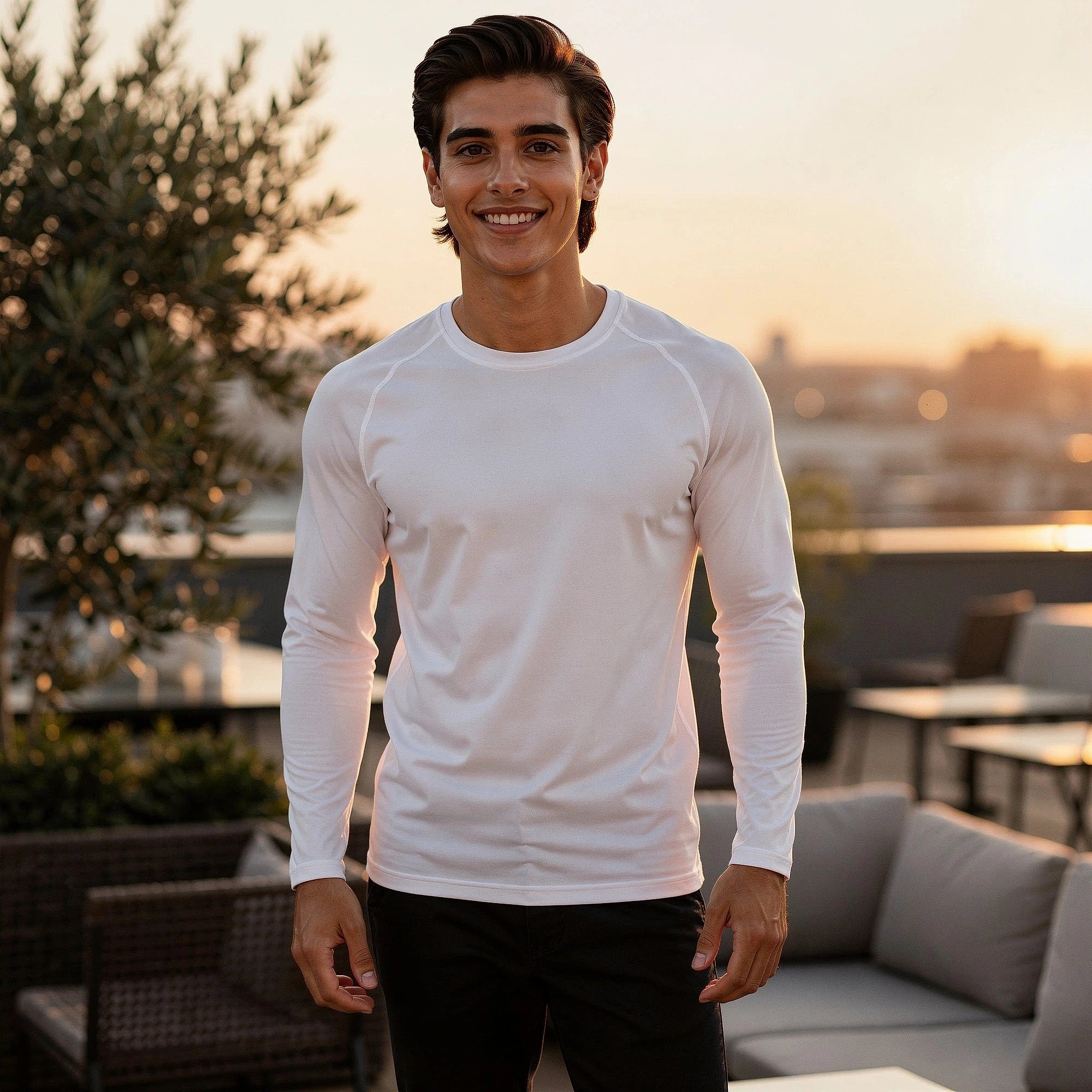 View of a sleek long sleeve tee in dark gray, made from quick dry material with a smooth finish