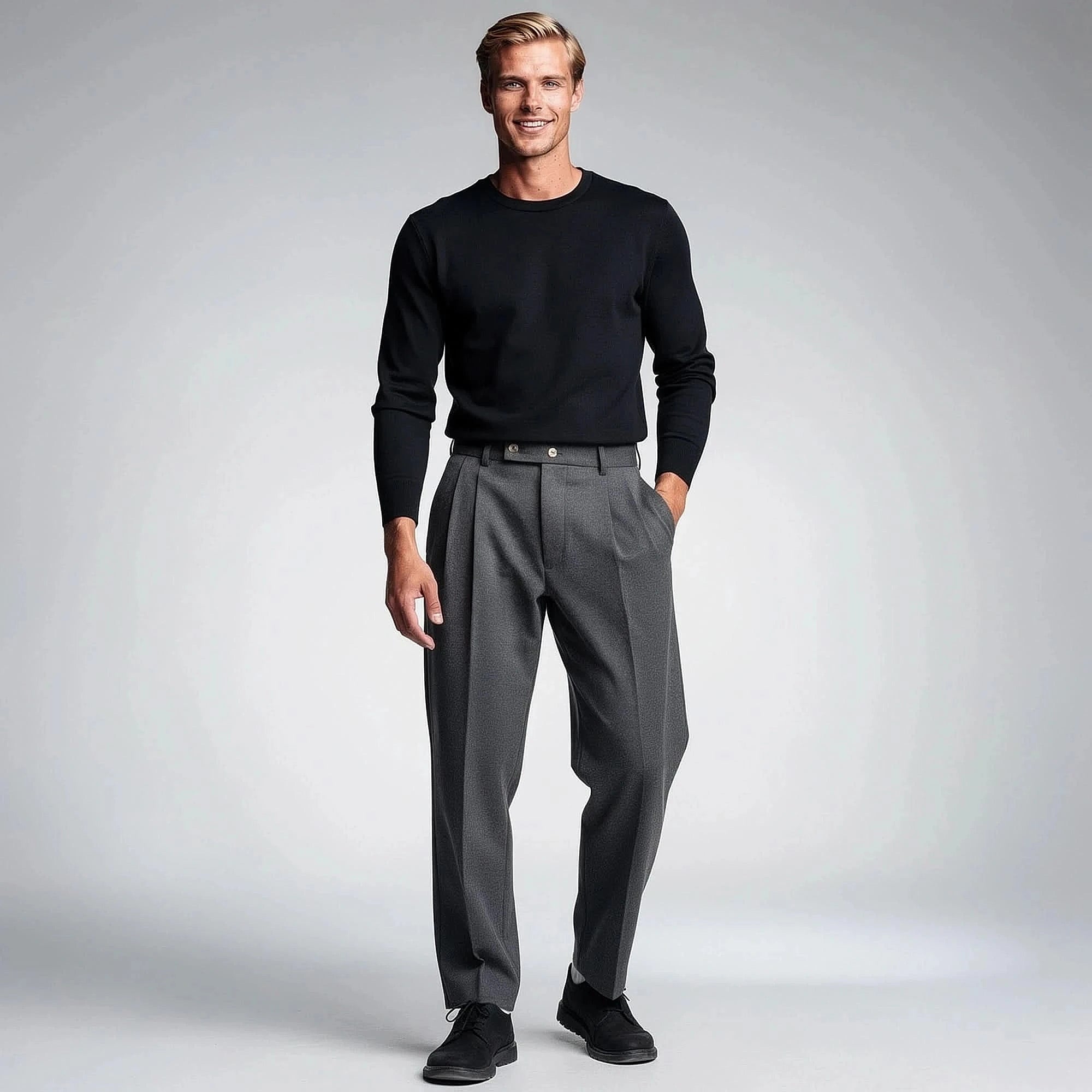 View of tailored high waisted straight trousers in charcoal gray, featuring a smooth fabric and clean lines