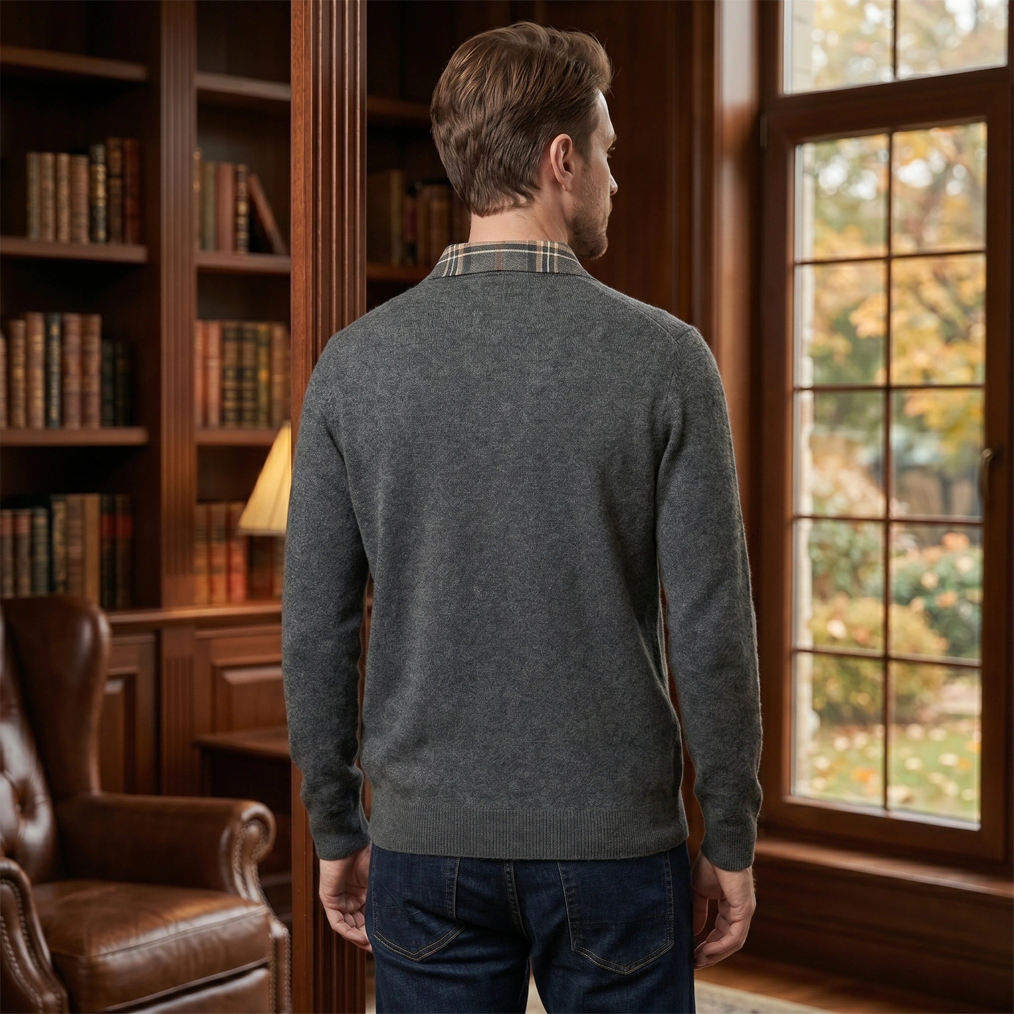 Close up view of the Men's Classic Button Polo Sweater showing the intricate stitching and soft fabric texture, emphasizing its quality and classic design.