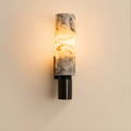 View of a chic Art Deco marble wall sconce featuring a gold metal frame and elegant white marble accents