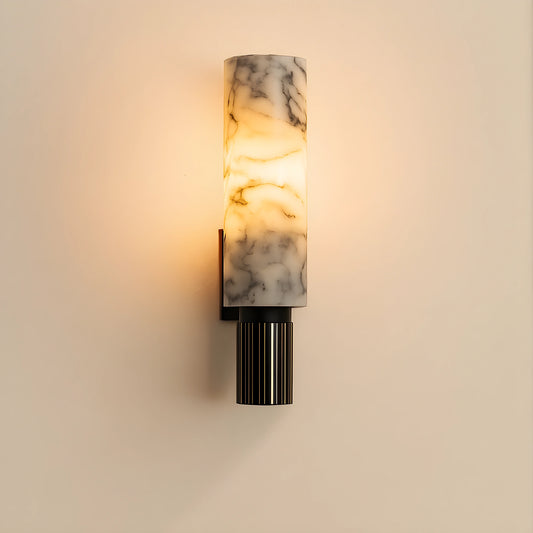 View of a chic Art Deco marble wall sconce featuring a gold metal frame and elegant white marble accents