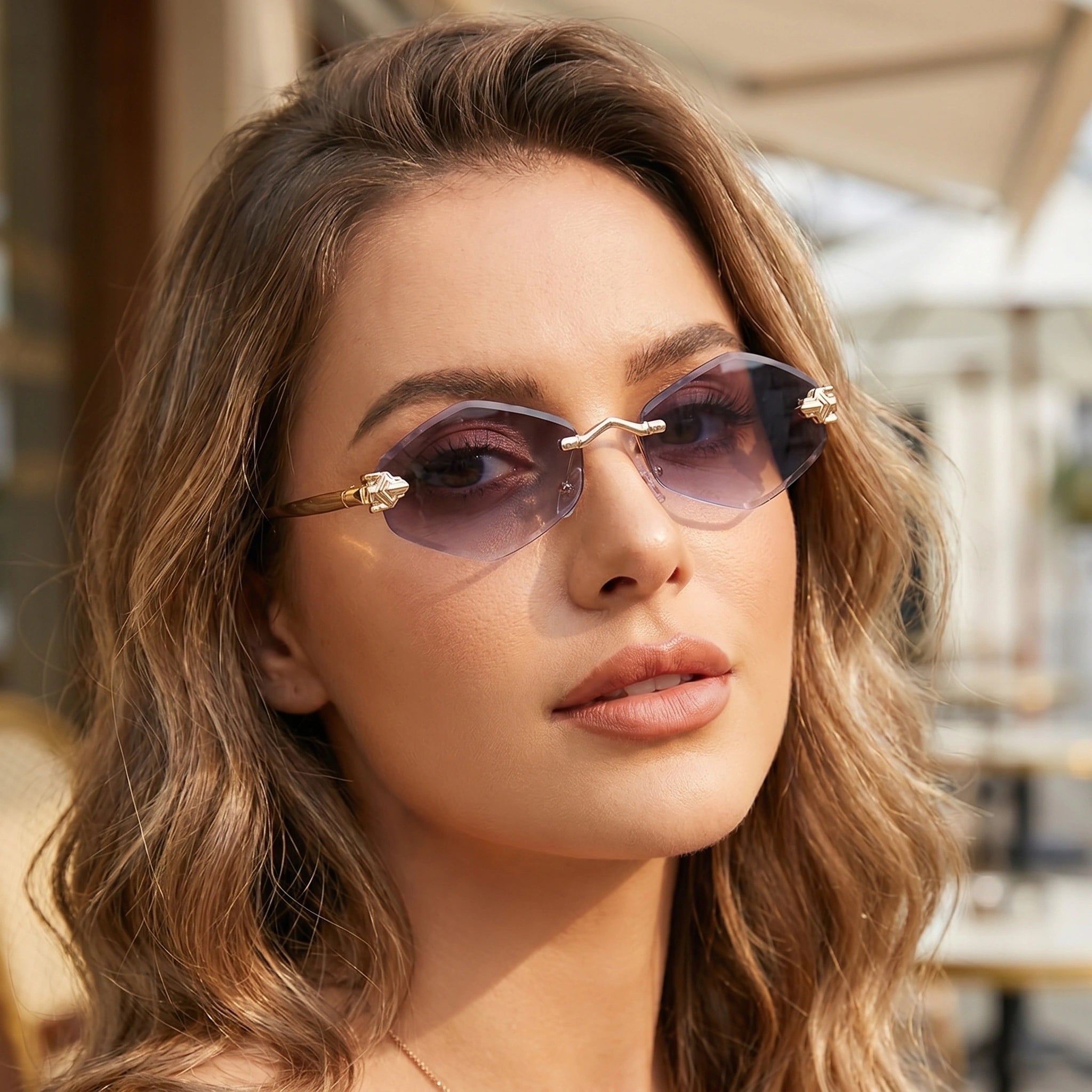 A model showcases Womens Vintage Polygonal Sunglasses in a outfit showing a light beige high waisted dress, set against a soft pastel background.