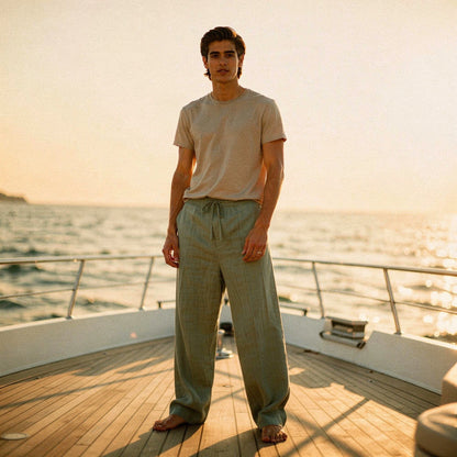 Lightweight casual trousers in a relaxed fit, featuring a soft fabric, pockets, and a neutral beige color, view