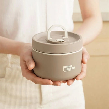 View of a chic insulated meal container set in a sleek gray finish, featuring sturdy handles and a compact design for on the go dining
