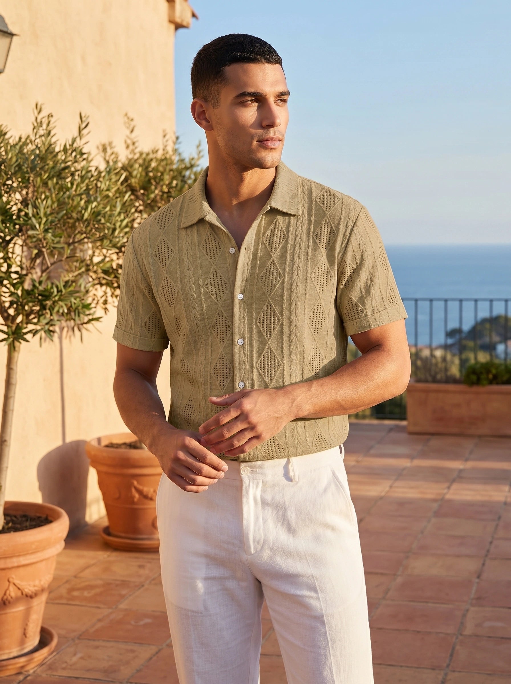 Close up of the Mens Refined Tailored Summer Shirt showing its lightweight fabric, precise stitching, and collar against a neutral background.
