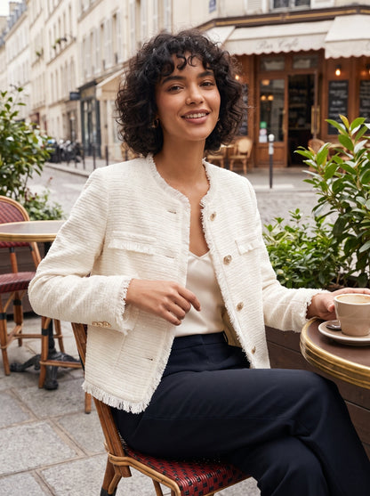 Close up of the women's textured spring crop jacket showing its intricate stitching and luxurious fabric, perfect for versatile styling.