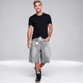 Relaxed denim knee length shorts in light blue, featuring a classic five pocket design and a view