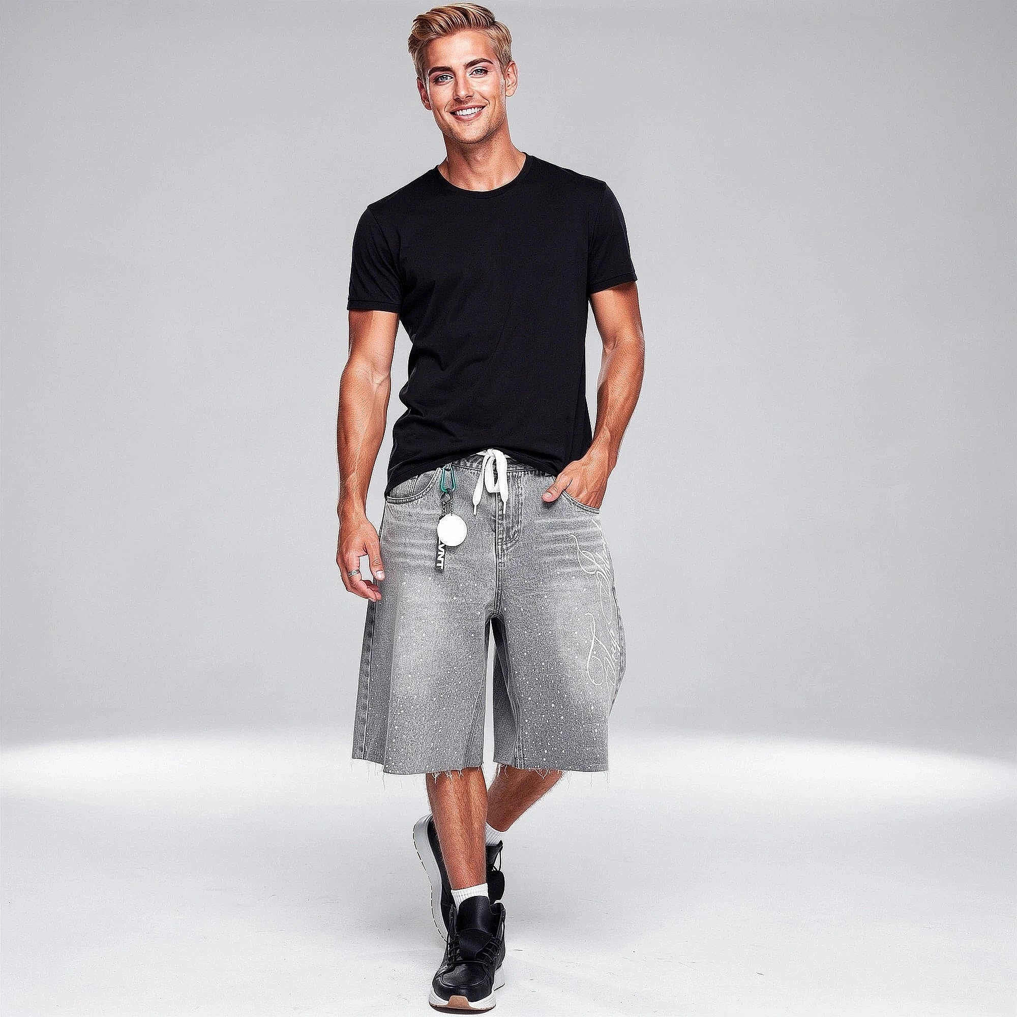 Relaxed denim knee length shorts in light blue, featuring a classic five pocket design and a view
