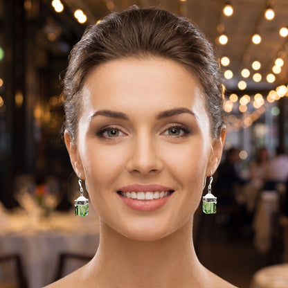 Back view of a model showing drop peridot earrings, showing intricate construction details against a soft, neutral background, perfect for any occasion.