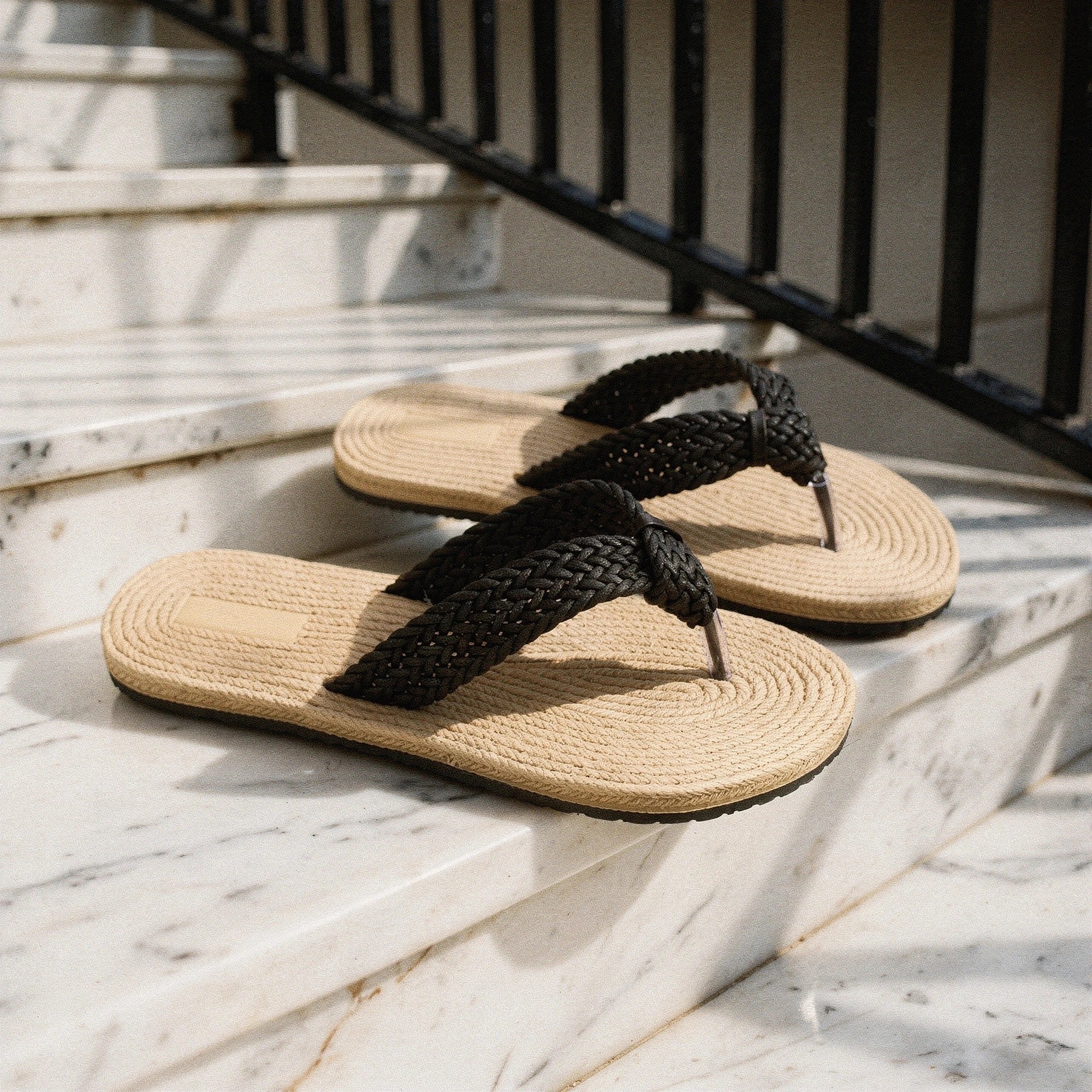 View of relaxed textured imitation hemp flip flops in natural beige color, showcasing the soft material and comfortable sole
