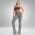 View of soft stretch trousers in a light gray color, featuring a relaxed fit and elastic waistband