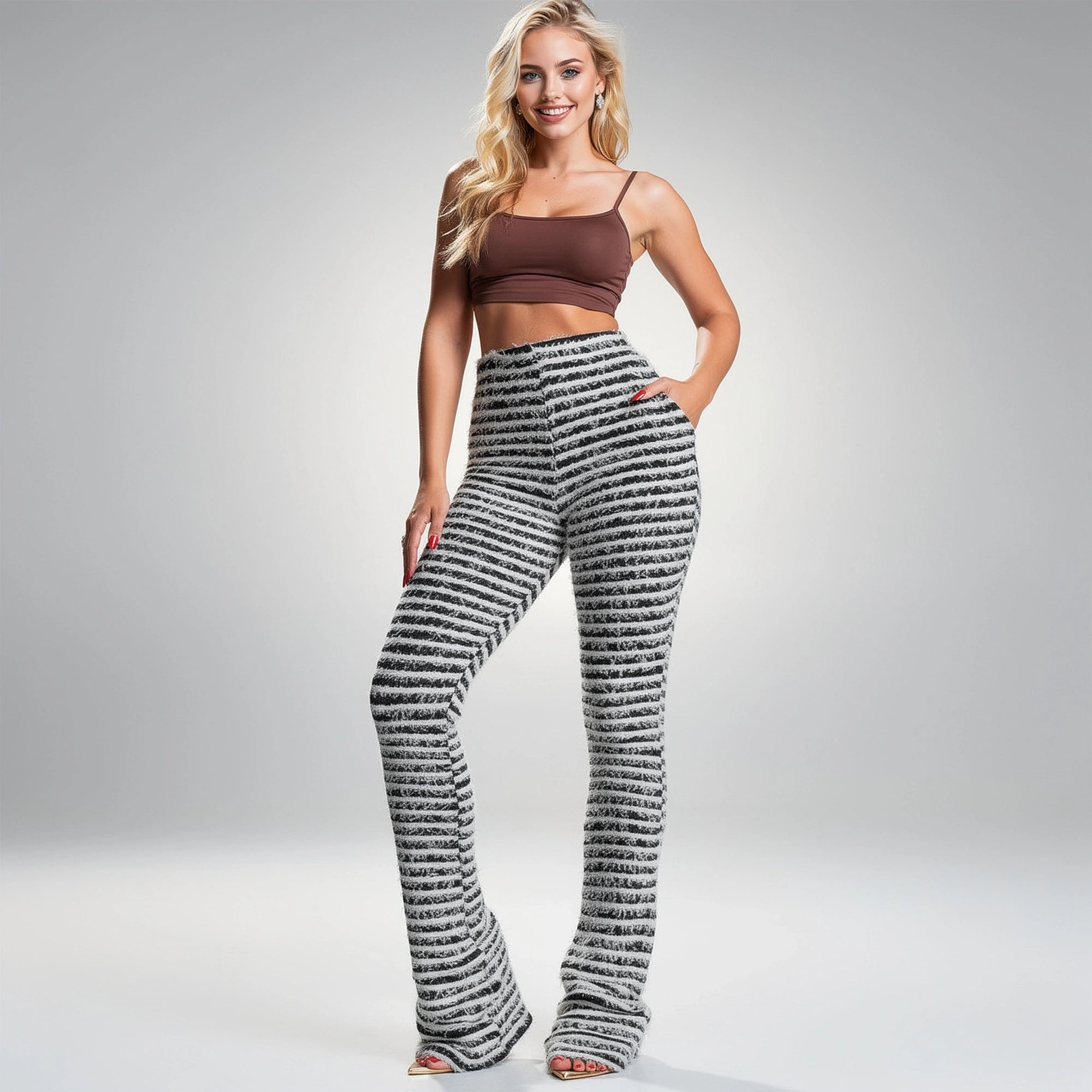 View of soft stretch trousers in a light gray color, featuring a relaxed fit and elastic waistband