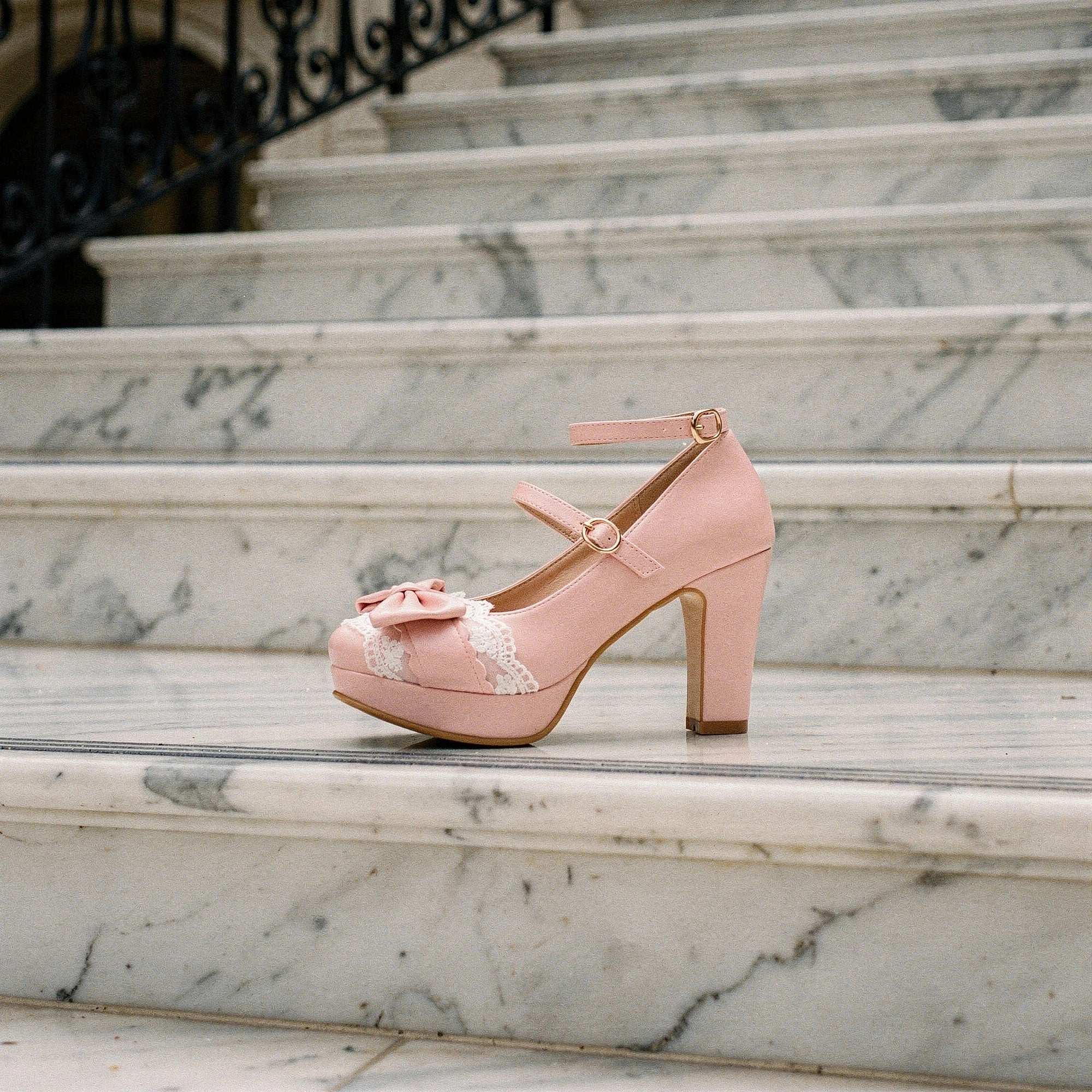 Elegant high heeled shoes in soft velvet with charming lace frill , showcasing a view and intricate textures