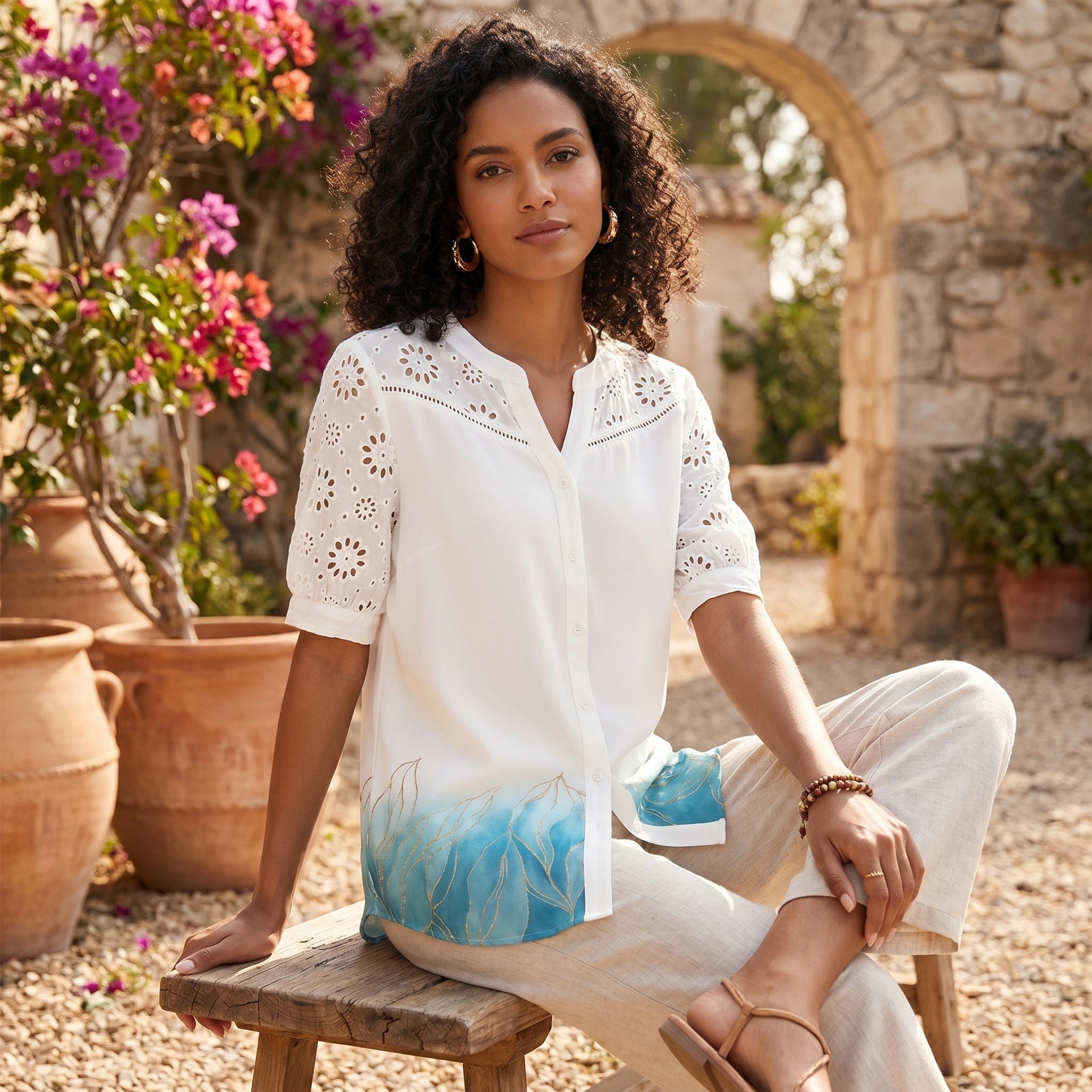 Close up view of the Womens Relaxed Summer Blouse showing the soft fabric texture, delicate stitching, and sophisticated design details against a neutral background.