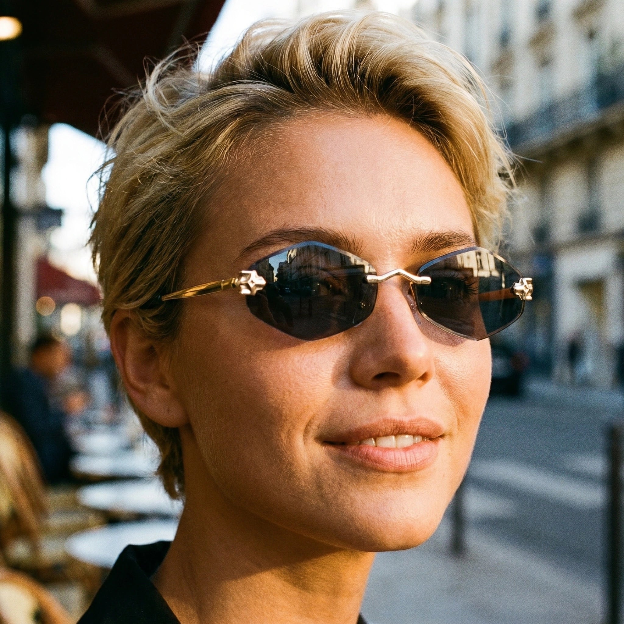 Close up of the Womens Vintage Polygonal Sunglasses showing the frame design, showing the polished finish and intricate detailing against a soft neutral background.